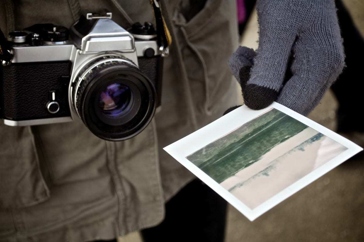 cameras and gloves for travellers