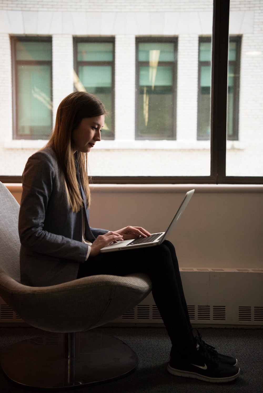 Woman remote working using laptop 