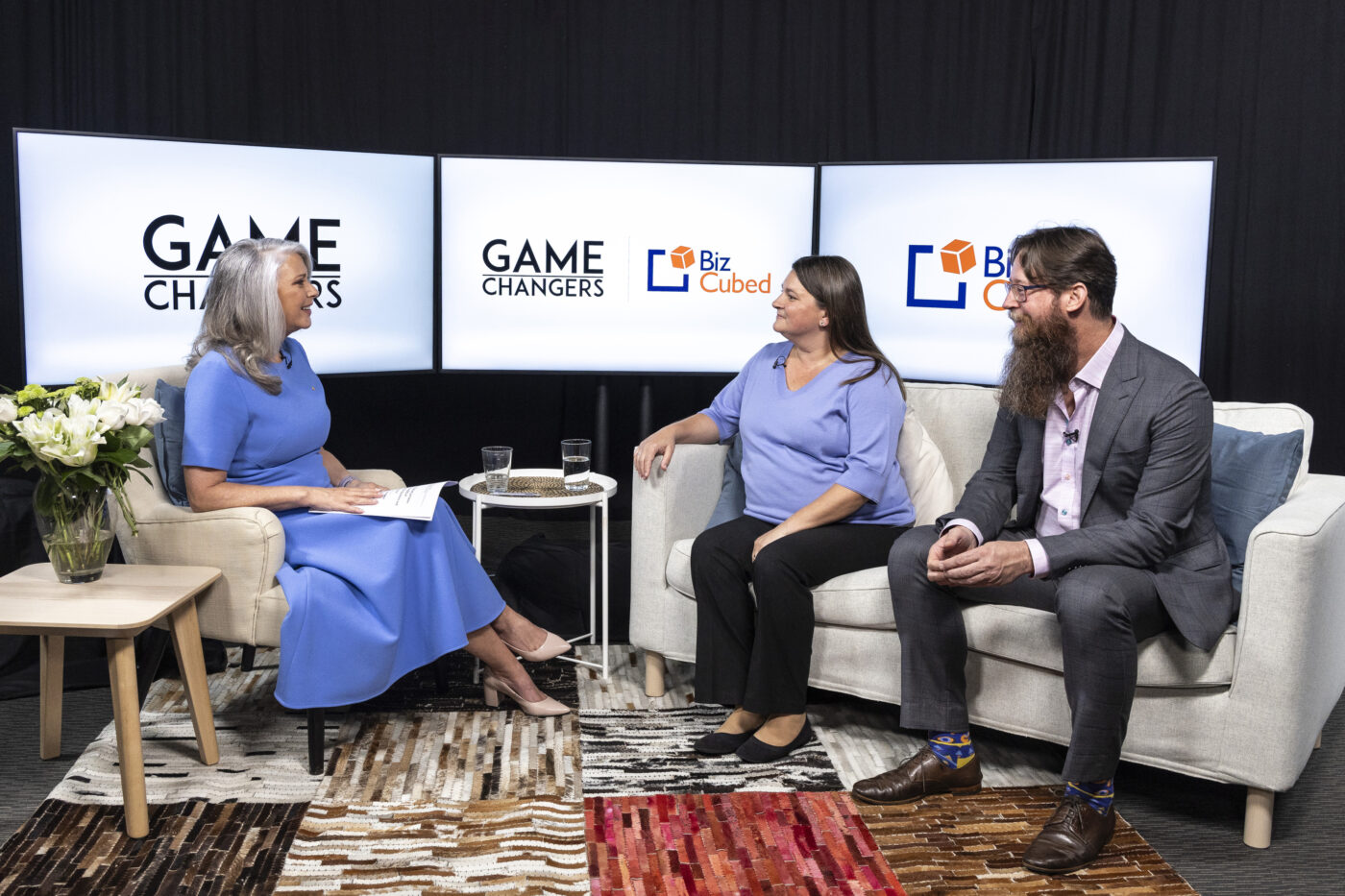 Rebecca and Zachary Zeus from Bizcubed with Tracey Spicer on the set of Game Changers